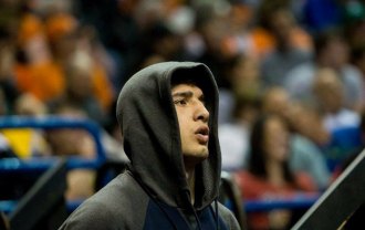 Lemoore's Isaiah Martinez vows he'll return to the NCAA finals after surprising loss Saturday night in NCAA Finals.